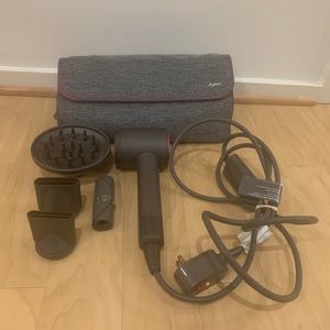 Dyson Supersonic hair dryer in Iron/Fuchsia